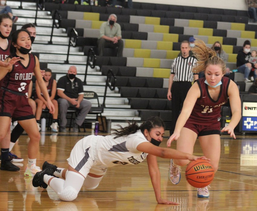 Prairie View's Michaela Ramirez gets to the ball ahead of Golden's Mia Howe during the first Nate Howard Memorial Girls Basketball Tournament Dec. 2, 2021.